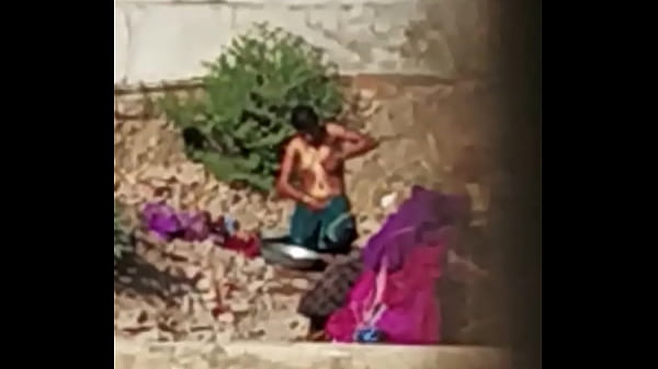 Naked Indian Maid Bathing In The Open